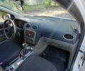 Білий Форд Фокус, об'ємом двигуна 2 л та пробігом 145 тис. км за 5510 $, фото 4 на Automoto.ua
