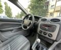 Белый Форд Фокус, объемом двигателя 1.4 л и пробегом 213 тыс. км за 5300 $, фото 7 на Automoto.ua