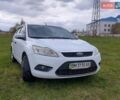 Белый Форд Фокус, объемом двигателя 1.39 л и пробегом 200 тыс. км за 4800 $, фото 1 на Automoto.ua