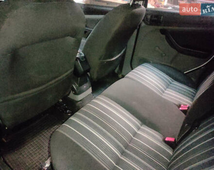 Белый Форд Фокус, объемом двигателя 1.39 л и пробегом 260 тыс. км за 4400 $, фото 8 на Automoto.ua