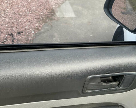 Белый Форд Фокус, объемом двигателя 1.4 л и пробегом 247 тыс. км за 6500 $, фото 11 на Automoto.ua