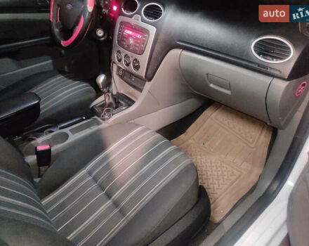 Белый Форд Фокус, объемом двигателя 1.39 л и пробегом 260 тыс. км за 4400 $, фото 7 на Automoto.ua