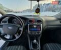 Білий Форд Фокус, об'ємом двигуна 1.4 л та пробігом 215 тис. км за 5300 $, фото 8 на Automoto.ua