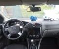 Білий Форд Фокус, об'ємом двигуна 1.39 л та пробігом 179 тис. км за 6200 $, фото 7 на Automoto.ua