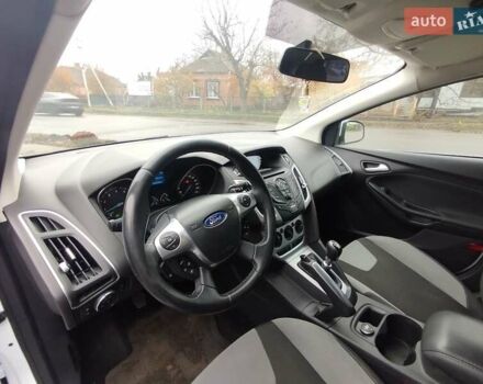 Білий Форд Фокус, об'ємом двигуна 1.6 л та пробігом 266 тис. км за 6999 $, фото 58 на Automoto.ua