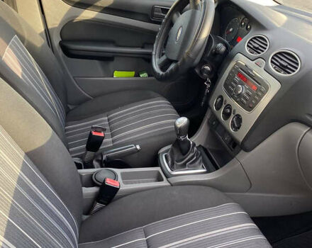 Белый Форд Фокус, объемом двигателя 1.4 л и пробегом 234 тыс. км за 6300 $, фото 2 на Automoto.ua