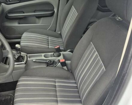 Білий Форд Фокус, об'ємом двигуна 1.4 л та пробігом 91 тис. км за 6800 $, фото 40 на Automoto.ua