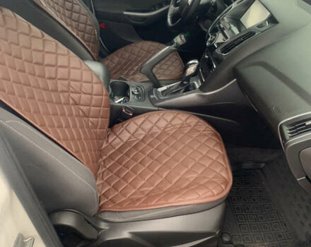 Білий Форд Фокус, об'ємом двигуна 2 л та пробігом 277 тис. км за 7999 $, фото 4 на Automoto.ua