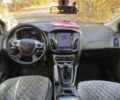 Белый Форд Фокус, объемом двигателя 1 л и пробегом 188 тыс. км за 5999 $, фото 10 на Automoto.ua