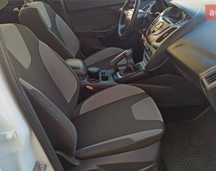 Білий Форд Фокус, об'ємом двигуна 1 л та пробігом 152 тис. км за 6630 $, фото 5 на Automoto.ua