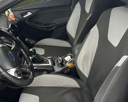 Белый Форд Фокус, объемом двигателя 1 л и пробегом 149 тыс. км за 6600 $, фото 6 на Automoto.ua