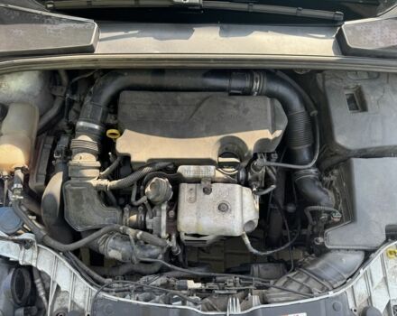 Белый Форд Фокус, объемом двигателя 1 л и пробегом 228 тыс. км за 6000 $, фото 10 на Automoto.ua