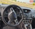 Белый Форд Фокус, объемом двигателя 1 л и пробегом 121 тыс. км за 6800 $, фото 11 на Automoto.ua