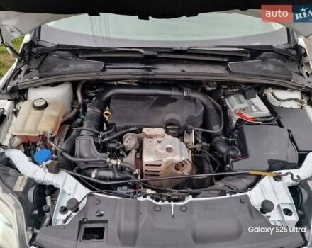 Белый Форд Фокус, объемом двигателя 1 л и пробегом 149 тыс. км за 5600 $, фото 11 на Automoto.ua