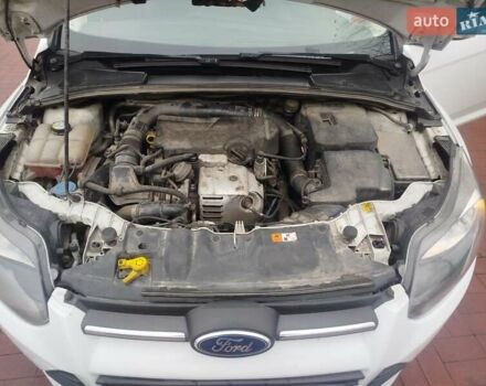 Белый Форд Фокус, объемом двигателя 1 л и пробегом 290 тыс. км за 6000 $, фото 16 на Automoto.ua