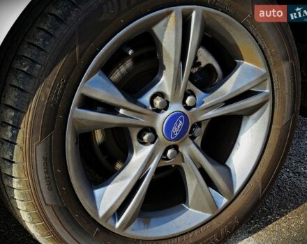 Білий Форд Фокус, об'ємом двигуна 1 л та пробігом 103 тис. км за 7500 $, фото 4 на Automoto.ua