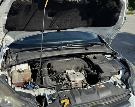 Белый Форд Фокус, объемом двигателя 1 л и пробегом 280 тыс. км за 5700 $, фото 4 на Automoto.ua