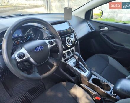 Белый Форд Фокус, объемом двигателя 2 л и пробегом 163 тыс. км за 7999 $, фото 9 на Automoto.ua