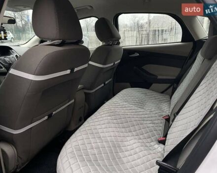 Белый Форд Фокус, объемом двигателя 2 л и пробегом 179 тыс. км за 7600 $, фото 21 на Automoto.ua