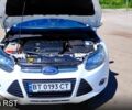 Белый Форд Фокус, объемом двигателя 1.6 л и пробегом 210 тыс. км за 7300 $, фото 5 на Automoto.ua
