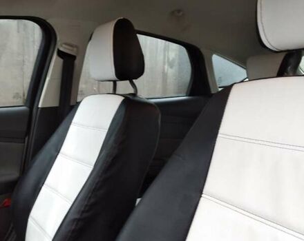 Білий Форд Фокус, об'ємом двигуна 1 л та пробігом 70 тис. км за 9500 $, фото 10 на Automoto.ua