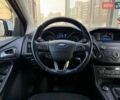 Белый Форд Фокус, объемом двигателя 1 л и пробегом 150 тыс. км за 8290 $, фото 14 на Automoto.ua