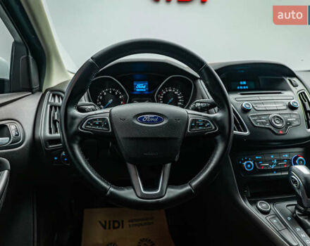 Білий Форд Фокус, об'ємом двигуна 1 л та пробігом 88 тис. км за 9788 $, фото 11 на Automoto.ua