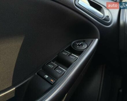 Белый Форд Фокус, объемом двигателя 1 л и пробегом 150 тыс. км за 8290 $, фото 15 на Automoto.ua