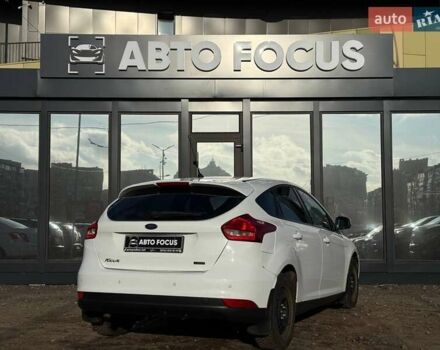 Белый Форд Фокус, объемом двигателя 1 л и пробегом 150 тыс. км за 8290 $, фото 7 на Automoto.ua