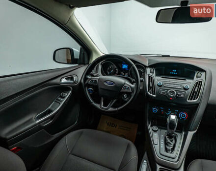 Білий Форд Фокус, об'ємом двигуна 1 л та пробігом 88 тис. км за 9788 $, фото 10 на Automoto.ua
