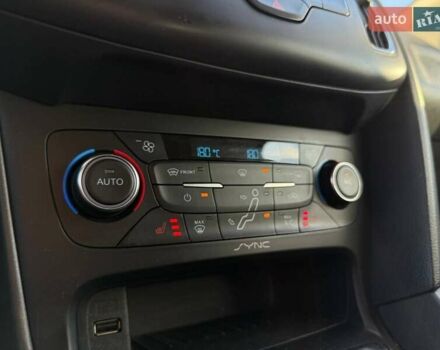 Белый Форд Фокус, объемом двигателя 1 л и пробегом 150 тыс. км за 8290 $, фото 17 на Automoto.ua