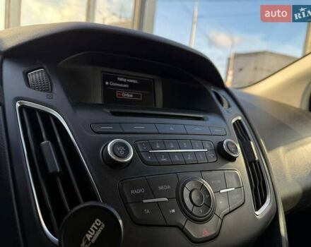 Белый Форд Фокус, объемом двигателя 1 л и пробегом 150 тыс. км за 8290 $, фото 18 на Automoto.ua