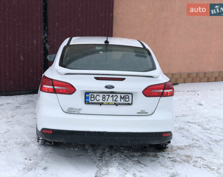 Білий Форд Фокус, об'ємом двигуна 2 л та пробігом 176 тис. км за 7800 $, фото 31 на Automoto.ua