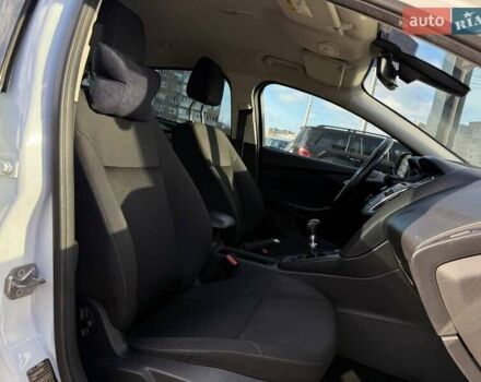 Белый Форд Фокус, объемом двигателя 1 л и пробегом 150 тыс. км за 8290 $, фото 11 на Automoto.ua