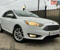 Белый Форд Фокус, объемом двигателя 2 л и пробегом 253 тыс. км за 6990 $, фото 1 на Automoto.ua