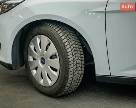 Білий Форд Фокус, об'ємом двигуна 1 л та пробігом 88 тис. км за 9788 $, фото 7 на Automoto.ua