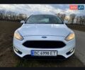 Белый Форд Фокус, объемом двигателя 1 л и пробегом 183 тыс. км за 6799 $, фото 1 на Automoto.ua