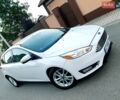 Білий Форд Фокус, об'ємом двигуна 2 л та пробігом 161 тис. км за 7469 $, фото 1 на Automoto.ua