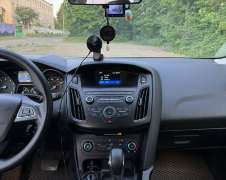 Білий Форд Фокус, об'ємом двигуна 2 л та пробігом 99 тис. км за 9400 $, фото 29 на Automoto.ua
