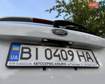 Білий Форд Фокус, об'ємом двигуна 2 л та пробігом 99 тис. км за 9400 $, фото 47 на Automoto.ua