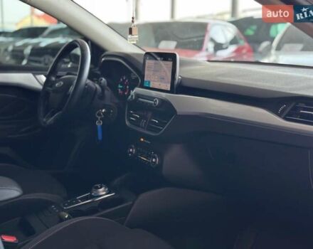 Белый Форд Фокус, объемом двигателя 1.5 л и пробегом 158 тыс. км за 14440 $, фото 19 на Automoto.ua