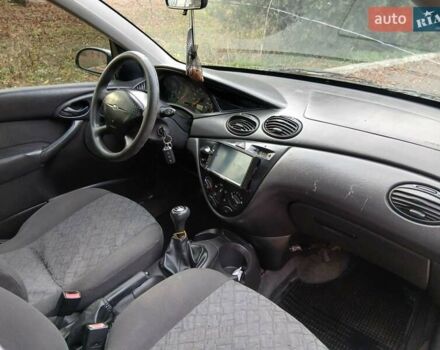 Белый Форд Фокус, объемом двигателя 1.6 л и пробегом 405 тыс. км за 2299 $, фото 1 на Automoto.ua