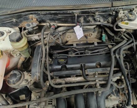 Белый Форд Фокус, объемом двигателя 1.6 л и пробегом 185 тыс. км за 3567 $, фото 3 на Automoto.ua