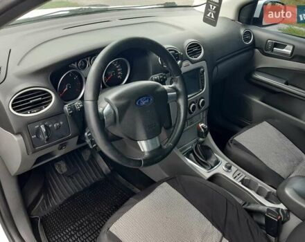 Белый Форд Фокус, объемом двигателя 1.6 л и пробегом 187 тыс. км за 5750 $, фото 16 на Automoto.ua