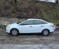 Білий Форд Фокус, об'ємом двигуна 2 л та пробігом 150 тис. км за 5990 $, фото 4 на Automoto.ua