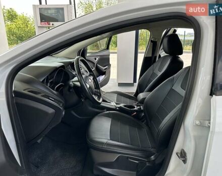 Белый Форд Фокус, объемом двигателя 2 л и пробегом 160 тыс. км за 7900 $, фото 32 на Automoto.ua