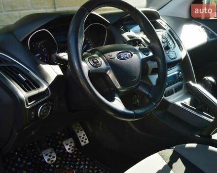 Белый Форд Фокус, объемом двигателя 1 л и пробегом 234 тыс. км за 5950 $, фото 16 на Automoto.ua