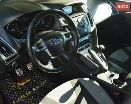 Белый Форд Фокус, объемом двигателя 1 л и пробегом 234 тыс. км за 5950 $, фото 14 на Automoto.ua