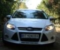 Білий Форд Фокус, об'ємом двигуна 2 л та пробігом 159 тис. км за 9600 $, фото 1 на Automoto.ua