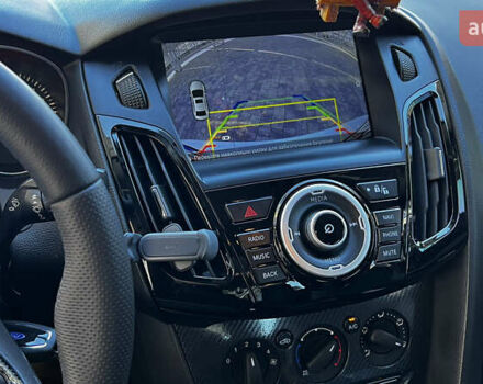 Білий Форд Фокус, об'ємом двигуна 1 л та пробігом 131 тис. км за 8500 $, фото 13 на Automoto.ua